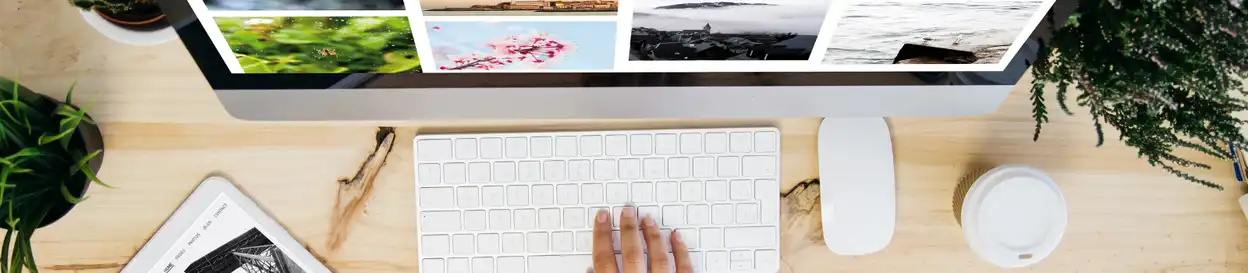 A teacher looking at designs for a portfolio