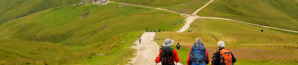 tourists on a hike in the hills