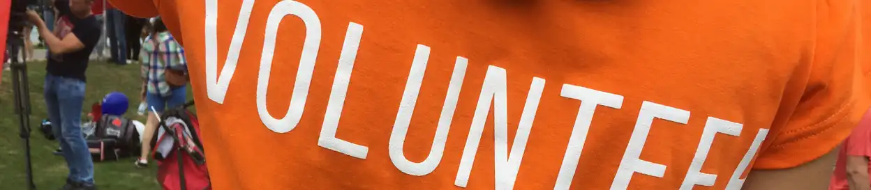 someone in a volunteer t-shirt