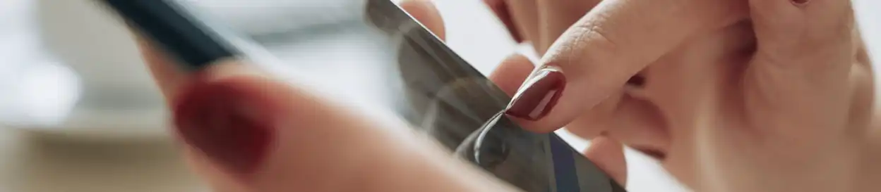 A woman browsing on a smartphone