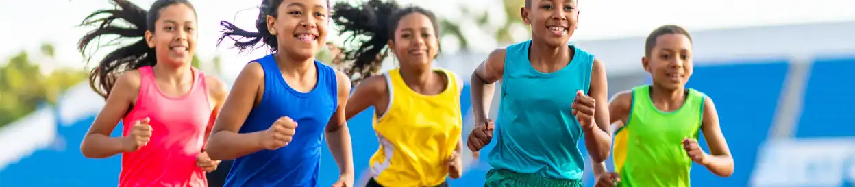 Five school kids running a race