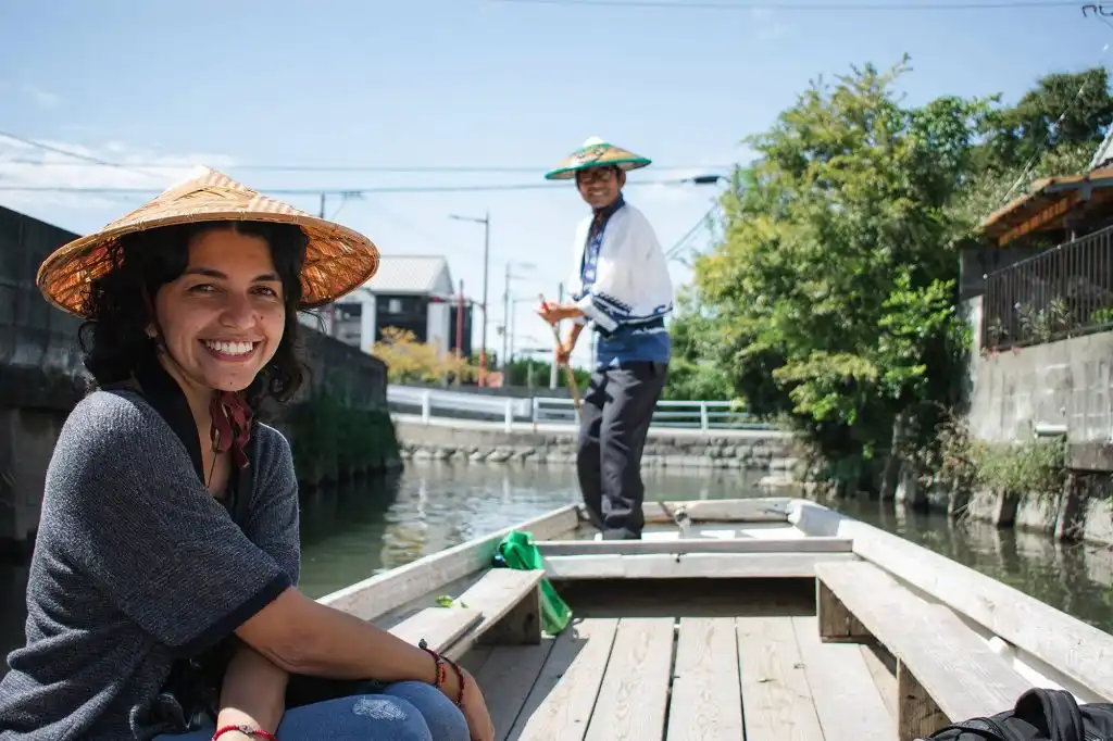 A woman on a boat in Japan