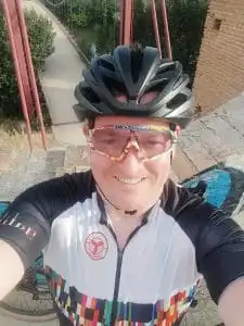 A man in cycling gear taking a selfie