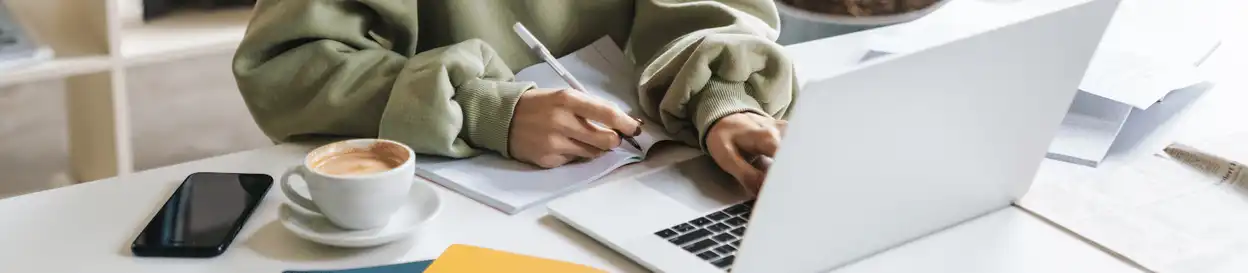 A woman working on a laptop