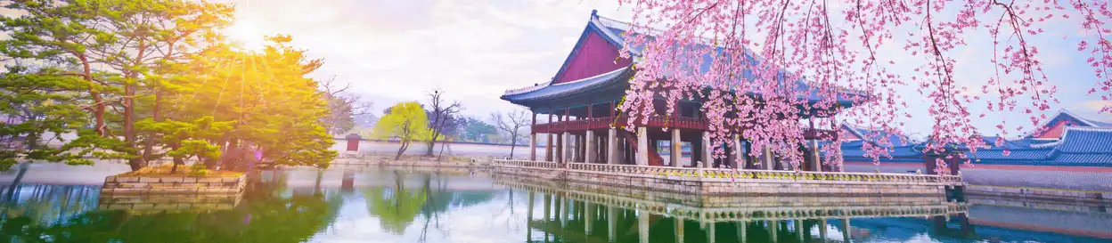 A traditional South Korean building beside a lake