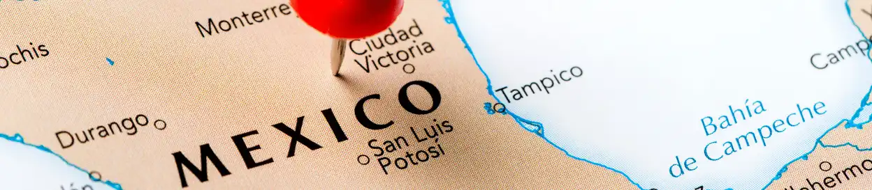 A map of Mexico with a  red pin in it