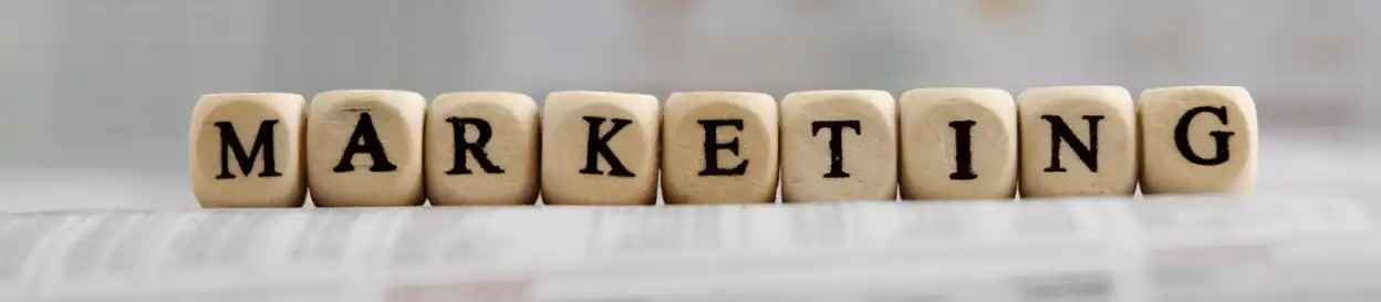 Wooden blocks spelling out the word 'marketing'