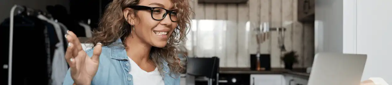 A woman talking to someone via video call